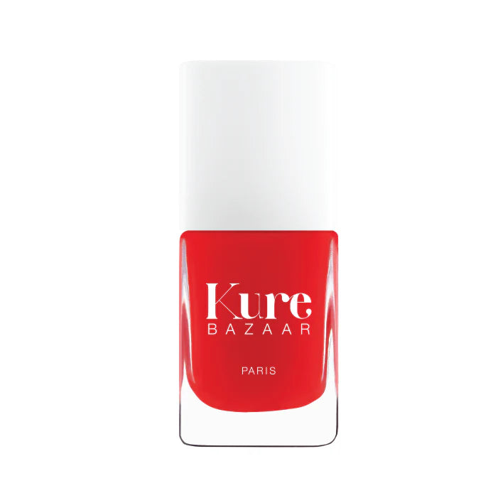 A bottle of kure bazaar nail polish in spicy vvee. 