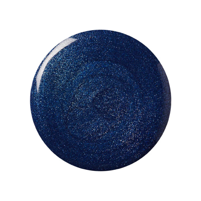 A bottle of Kure Bazaar nail polish in a blue shade with a metallic finish, displayed against a white background.