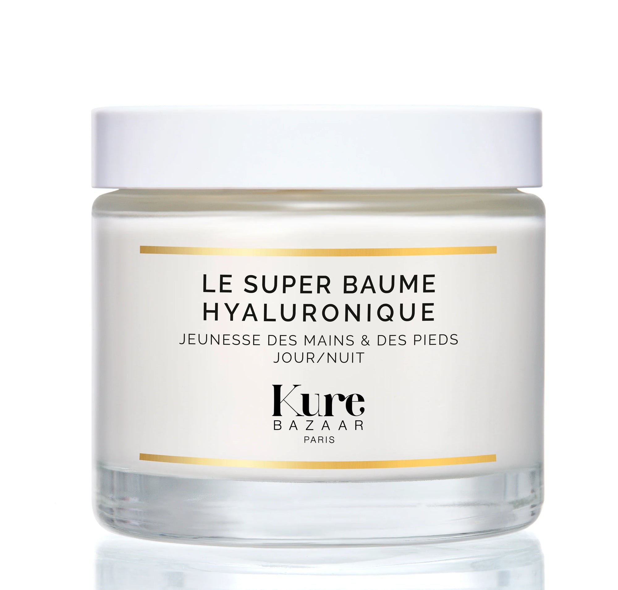 A clear jar with a white lid containing the Kure Bazaar Hyaluronic Super Balm, labeled for hands and feet.