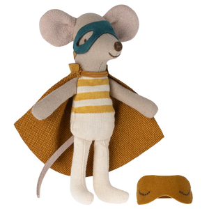 Toy mouse in superhero costume with cape and mask on a white background