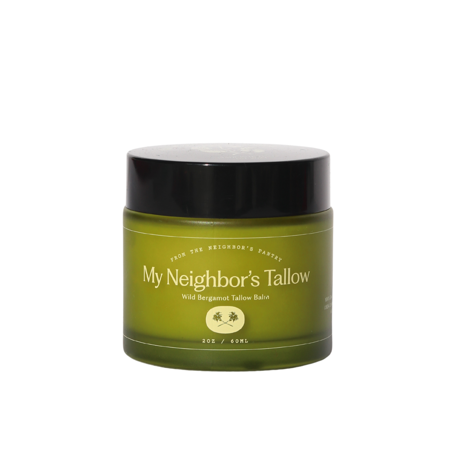 Green jar with black lid labeled 'My Neighbor's Tallow' on a white background
