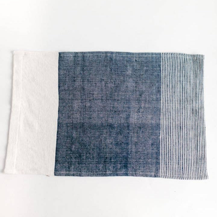 A color block tea towel in blue and white. 