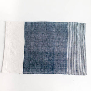 A color block tea towel in blue and white. 