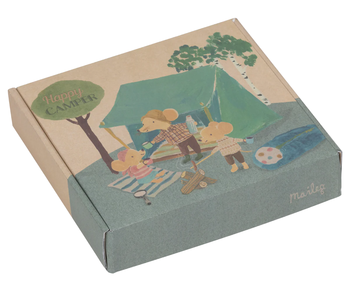 Illustrated box with camping scene and 'Happy Camper' text