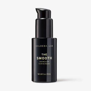 A black pump bottle labeled 'Caldera + Lab | The Smooth Shaving Cream' with 50 ml volume indicated.