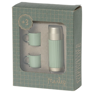 Thermos and mugs set in packaging