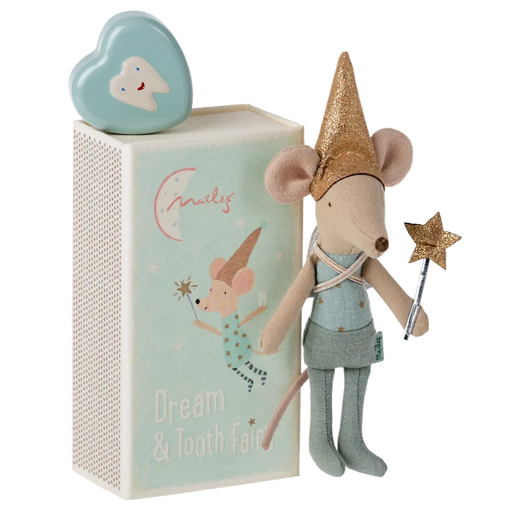 Stuffed mouse toy with fairy outfit and accessories in front of a decorative box.