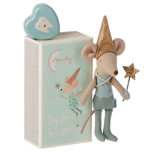 Stuffed mouse toy with fairy outfit and accessories in front of a decorative box.