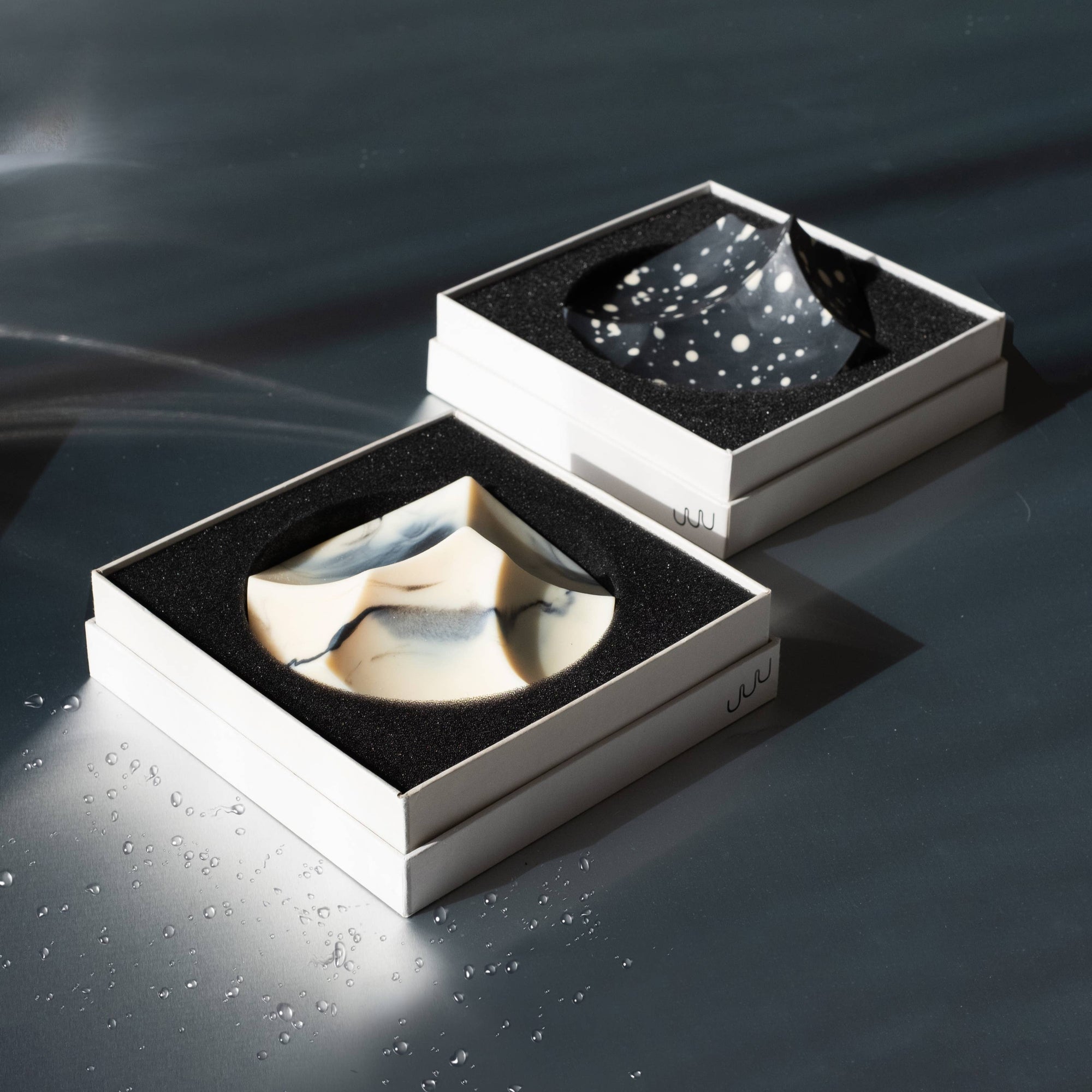 An ume studios architectural soap in a grey box. 
