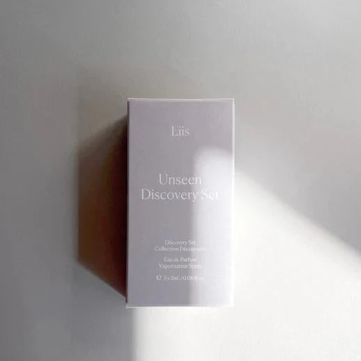 A boxed perfume set labeled 'Liis | Eau de Parfum - Unseen Discovery Set' displayed against a light background.