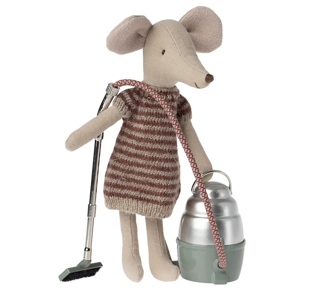 Stuffed mouse toy with a striped dress, vacuum cleaner, and bucket on a white background