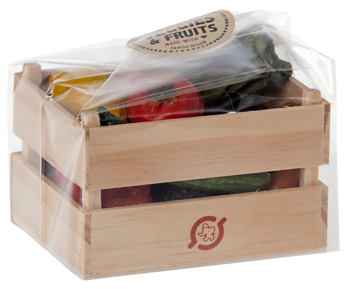 Wooden crate with fruits and vegetables wrapped in clear plastic on a white background.