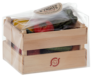 Wooden crate with fruits and vegetables wrapped in clear plastic on a white background.