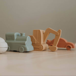 A line of silicone vehicle bath toys