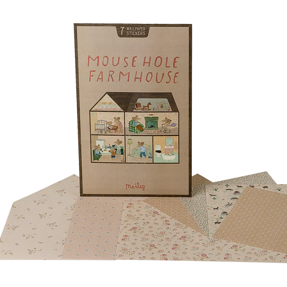 A pack of wallpaper with seven stickers designed for a Mouse Hole Farmhouse, showing rooms with different prints and colors.