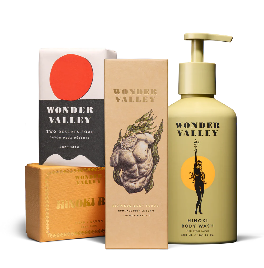 Collection of Wonder Valley products including soap, body wash, and a box on a white background