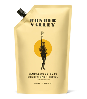 A refill bag of the Sandalwood Yuzu hair conditioner, made by Wonder Valley in California